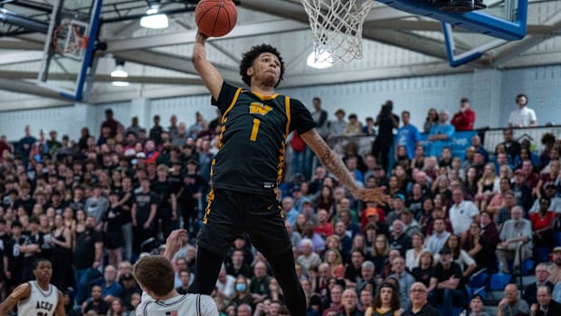 Jalil Bethea goes up for a dunk before Joining Miami (FL) in ACC action