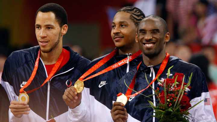 Tayshaun Prince, Carmelo Anthony y Kobe Bryant con las medallas de oro conseguidas en los Juegos Olímpicos 