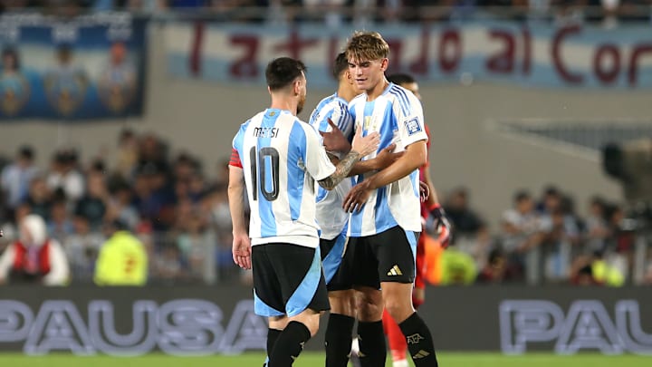 Nico Paz and Lionel Messi 