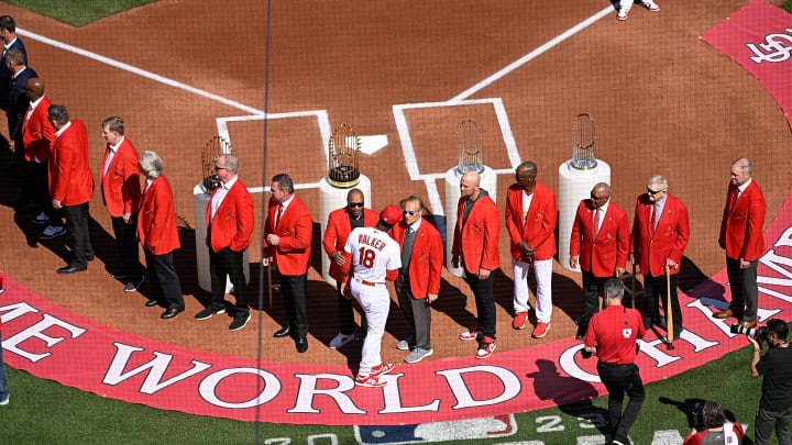 Jordan Walker shakes hands with the Red Jackets on Opening Day. 