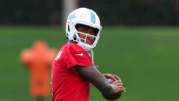 Tua Tagovailoa throwing on the side at the recent Miami Dolphins Mandatory Minicamp. Tagovailoa might have his market price set for a new extension based on the massive deal that Trevor Lawrence just signed with the Jaguars.