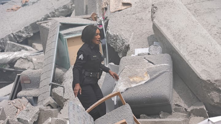 9-1-1 - “Seismic Shifts” - The 118, still reeling from their recent loss, is dispatched to a mass casualty event after a high-rise apartment building collapses. Then, Athena and Chimney have to work together to save a familiar face.THURSDAY, MAY 15 (8:00-9:00 p.m. EDT) on ABC. (Disney/Christopher Willard) 
ANGELA BASSETT