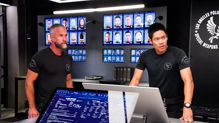 “Open Season” – 20-Squad must race to uncover a dangerous enemy intent on revenge. Also, Deacon and Tan butt heads over Tan’s changes to SWAT academy, on S.W.A.T., Friday, Jan. 31 (10:00-11:00 PM, ET/PT) on the CBS Television Network, and streaming on Paramount+. Series star Jay Harrington directs. Pictured (L-R): Patrick St. Esprit Commander Robert Hicks and David Lim as Victor Tan. Photo: Bill Inoshita/Sony Pictures Television/CBS Broadcasting, Inc. All Rights Reserved.