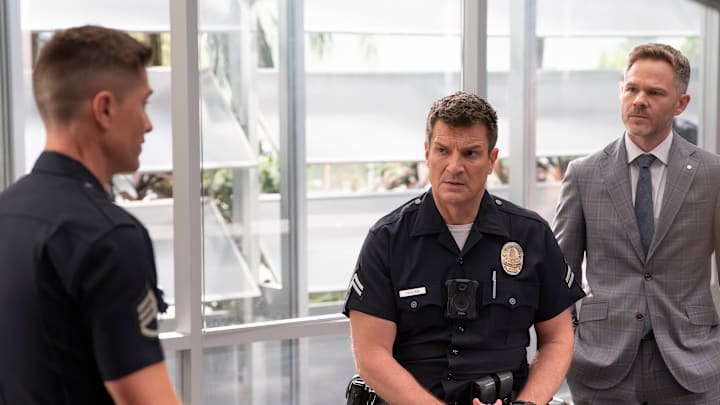 THE ROOKIE - “The Red Place” - Nolan makes a quiet arrest, and Lucy and Celina race to rescue a kidnapping victim. Meanwhile, Harper and Lopez help outsmart a killer, and Miles visits a familiar face. TUESDAY, JAN. 20 (10:00-11:00 p.m. EST) on ABC. (Disney/Mike Taing) 
NATHAN FILLION, SHAWN ASHMORE