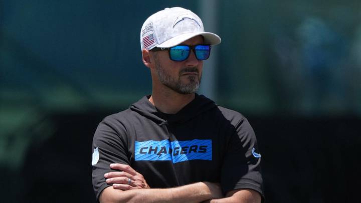 Jun 16, 2025; El Segundo, CA, USA; Los Angeles Chargers defensive coordinator Jesse Minter watches during organized team activities at The Bolt. Mandatory Credit: Kirby Lee-Imagn Images