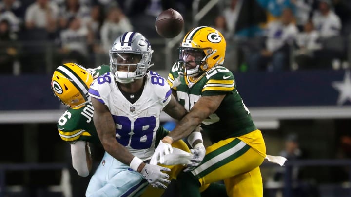 Green Bay Packers cornerback Keisean Nixon (25) and Green Bay Packers safety Anthony Johnson Jr. (36) break up a pass intended for Dallas Cowboys wide receiver CeeDee Lamb (88) during the fourth quarter of their wild card playoff game Sunday, January 14, 2024 at AT&T Stadium in Arlington, Texas.