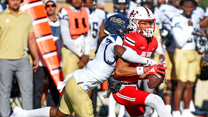 Jacksonville State's Cam Vaughn tries to evade the tackle of FIU's Brian Blades II during college football action at AmFirst Stadium in Jacksonville, Alabama November 16, 2024. (Dave Hyatt / Hyatt Media LLC)