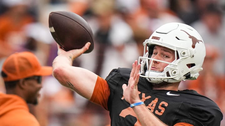 Texas Longhorns quarterback Quinn Ewers (3) throws a pass while warming up ahead of the Longhorns' spring Orange and White game at Darrell K Royal Texas Memorial Stadium in Austin, Texas, April 20, 2024.