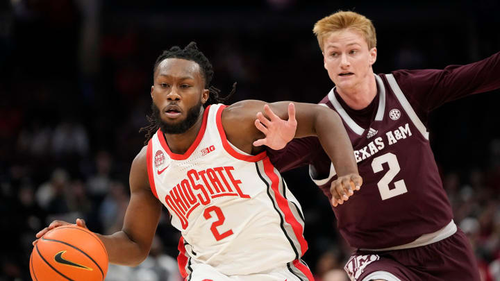 Nov 10, 2023; Columbus, Ohio, USA; Ohio State Buckeyes guard Bruce Thornton (2) dribbles past Texas A&M Aggies guard Hayden Hefner (2) during the first half of the NCAA basketball game at Value City Arena.