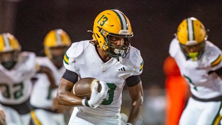 Bulldogs Braylon Calais 13 as the Opelousas High Tigers take on the Cecilia Bulldogs. Friday, Oct. 25, 2024.