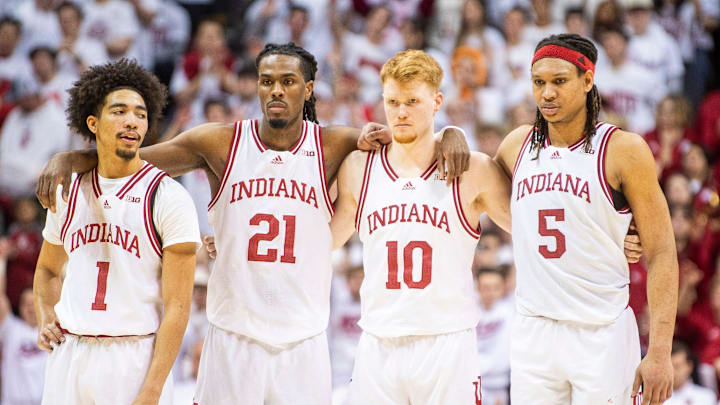 Indiana's Myles Rice (1), Mackenzie Mgbako (21), Luke Goode (10) and Malik Reneau (5) watch as Anthony Leal shoots a free throw during the Indiana versus Ohio State men's basketball game at Simon Skjodt Assembly Hall on Saturday, March 8, 2025.