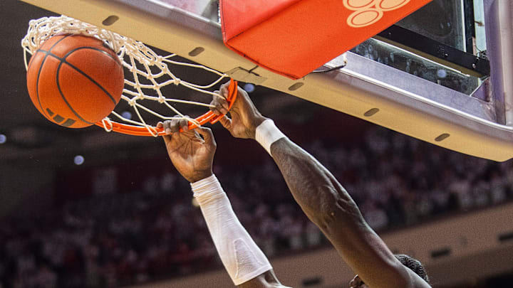 Indiana's Oumar Ballo (11) dunks during the Indiana versus Ohio State men's basketball game at Simon Skjodt Assembly Hall on Saturday, March 8, 2025.