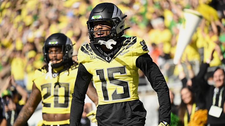 Oct 26, 2024; Eugene, Oregon, USA; Oregon Ducks wide receiver Tez Johnson (15) celebrates after scoring a touchdown during the first half against the Illinois Fighting Illini at Autzen Stadium. Mandatory Credit: Troy Wayrynen-Imagn Images