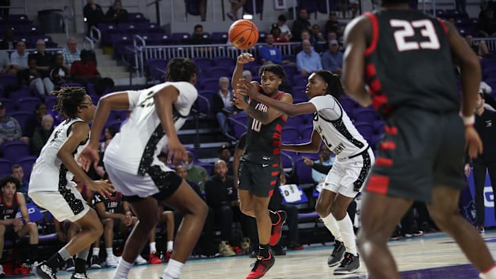 Syracuse basketball head coach Adrian Autry watched 4-star recruits Nigel James and Kiyan Anthony of Long Island Lutheran.