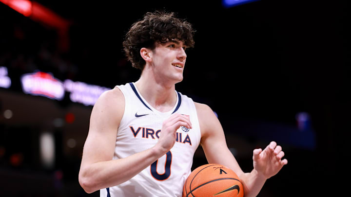 Mar 4, 2025; Charlottesville, Virginia, USA; Virginia Cavaliers forward Blake Buchanan (0) talks to the coaching staff in the second half against the Florida State Seminoles at John Paul Jones Arena. Mandatory Credit: Emily Faith Morgan-Imagn Images