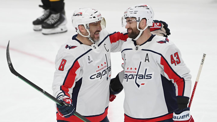 Apr 11, 2026; Pittsburgh, Pennsylvania, USA;  Washington Capitals left wing Alex Ovechkin (8) celebrates an empty net goal against the Pittsburgh Penguins with right wing Tom Wilson (43) during the third period at PPG Paints Arena. Mandatory Credit: Philip G. Pavely-Imagn Images