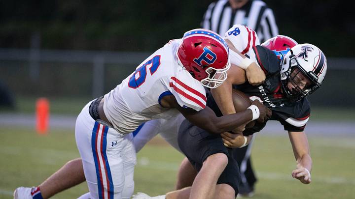 Tylon Lee (6) and Jackson Ward (42) sack quarterback John Nicholas (9) during the Pace vs West Florida football game at West Florida High School in Pensacola on Friday, Sept. 8, 2023.