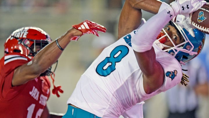 Coastal Carolina's Jameson Tucker tries to make a catch as Jacksonville State's Zechariah Poyser defends during college football action at Burgess-Snow Field AmFirst Stadium in Jacksonville, Alabama August 29, 2024. (Dave Hyatt / Special to the Gadsden Times)