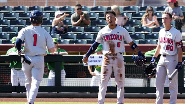 Arizona Wildcats Chase Davis (5) reacts after Garen Caulfield (1) hit a two-run home run against the Oregon Ducks in the second inning during the Pac-12 Baseball Tournament at Scottsdale Stadium on May 25, 2022.