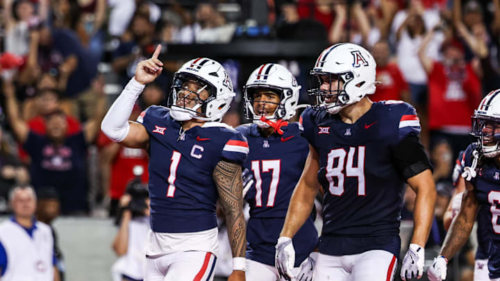 Aug 30, 2025; Tucson, Arizona, USA; Arizona Wildcats quarterback Noah Fifita (1) points up to the sky after scoring a touchdown during the third quarter of the game against the Hawaii Rainbow Warriors at Arizona Stadium. Mandatory Credit: Aryanna Frank-Imagn Images