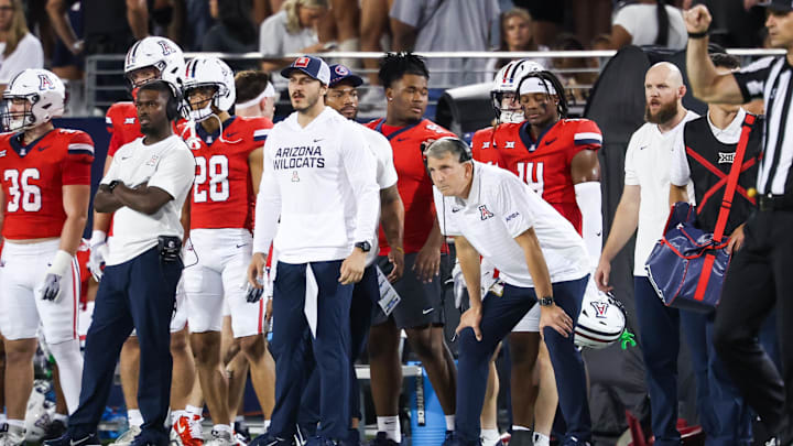 Sep 6, 2025; Tucson, Arizona, USA; Arizona Wildcats head coach Brent Brennan watches from the sidelines during the first quarter of the game against the Weber State Wildcats at Arizona Stadium. Mandatory Credit: Aryanna Frank-Imagn Images