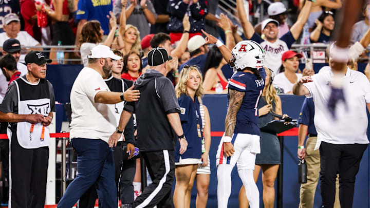 Sep 12, 2025; Tucson, Arizona, USA; Arizona Wildcats quarterback Noah Fifita (1) celebrates after a touchdown is confirmed by replay against the Kansas State Wildcats during the second quarter of the game at Arizona Stadium. Mandatory Credit: Aryanna Frank-Imagn Images