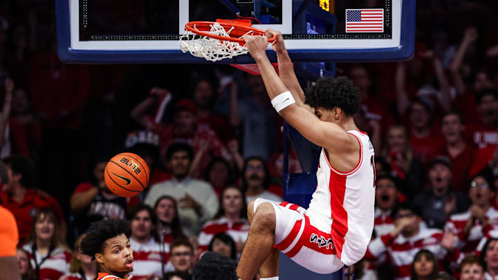 Dec 6, 2025; Tucson, Arizona, USA; Arizona Wildcats forward Koa Peat (10) dunks the ball over Auburn Tigers forward Keyshawn Hall (7) during the first half of the game at McKale Memorial Center. Mandatory Credit: Aryanna Frank-Imagn Images