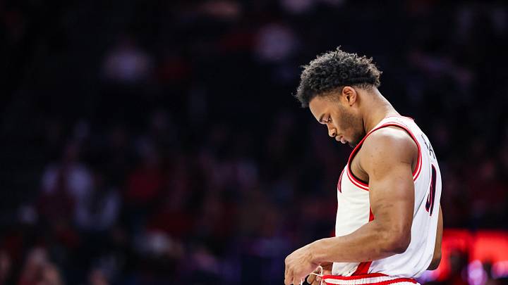 Dec 16, 2025; Tucson, Arizona, USA; Arizona Wildcats forward Tobe Awaka (30) fixes his uniform on the sidelines during the second half of the game against the Abilene Christian Wildcats at McKale Memorial Center. Mandatory Credit: Aryanna Frank-Imagn Images
