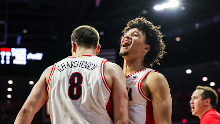 Dec 29, 2025; Tucson, Arizona, USA; Arizona Wildcats forward Ivan Kharchenkov (8) celebrates with guard Brayden Burries (5) during the second half of the game against the South Dakota State Jackrabbits at McKale Memorial Center. Mandatory Credit: Aryanna Frank-Imagn Images