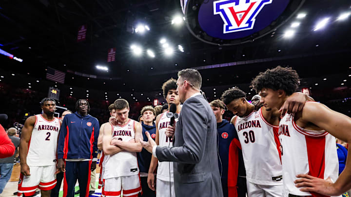 Jan 14, 2026; Tucson, Arizona, USA; Arizona Wildcats forward Koa Peat (10) and teammates talk to a reporter after securing the win against the Arizona State Sun Devils at McKale Memorial Center. Mandatory Credit: Aryanna Frank-Imagn Images