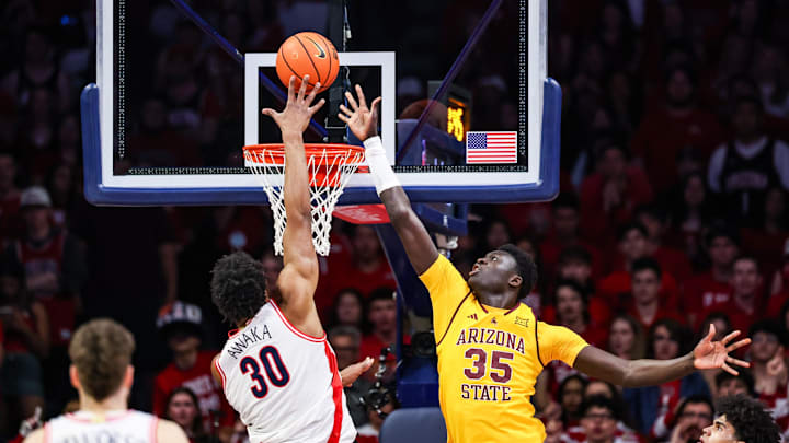 Jan 14, 2026; Tucson, Arizona, USA; Arizona Wildcats forward Tobe Awaka makes a lay up over Arizona State Sun Devils center Massamba Diop (35) during the first half of the game at McKale Memorial Center. Mandatory Credit: Aryanna Frank-Imagn Images