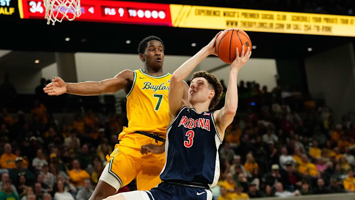 Feb 17, 2025; Waco, Texas, USA;  Arizona Wildcats guard Anthony Dell'Orso (3) drives to the basket as Baylor Bears guard VJ Edgecombe (7) defends during the first half at Paul and Alejandra Foster Pavilion. Mandatory Credit: Chris Jones-Imagn Images