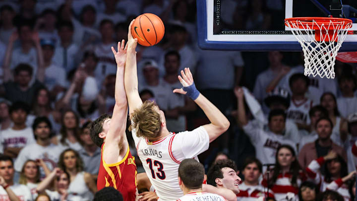 Mar 2, 2026; Tucson, Arizona, USA; Arizona Wildcats center Motiejus Krivas (13) rebounds the ball during the first half of the game against the Iowa State Cyclones at McKale Memorial Center. Mandatory Credit: Aryanna Frank-Imagn Images