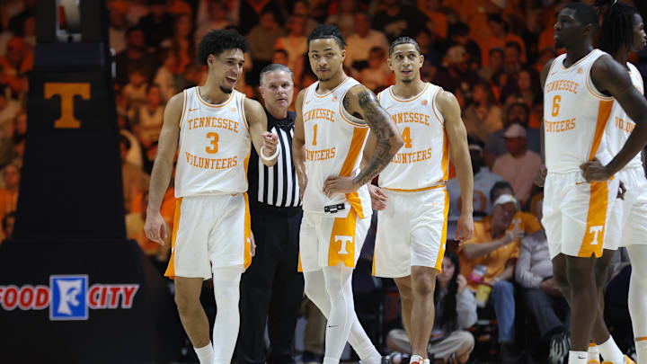 Dec 21, 2025; Knoxville, Tennessee, USA; Tennessee Volunteers guard Bishop Boswell (3) and guard Amari Evans (1) and guard Clarence Massamba (4) during the game against the Gardner-Webb Runnin' Bulldogs at Thompson-Boling Arena at Food City Center. Mandatory Credit: Randy Sartin-Imagn Images