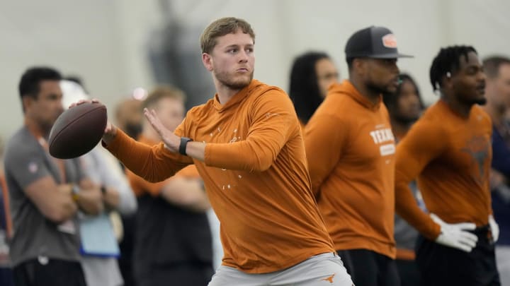 Quarterback Quinn Ewers throws passes to receivers who were participating in Texas Longhorns Football Pro Day at Frank Denius Fields Wednesday March 20, 2024.