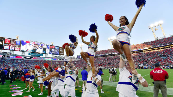 The Gator cheerleaders do what they can to keep the fans involved in the game at the start of the fourth quarter. The annual Florida vs Georgia football game at EverBank Stadium in Jacksonville, FL, Saturday, October 27, 2023. Georgia walked away with a final score of 43 to 20. [Bob Self/Florida Times-Union]