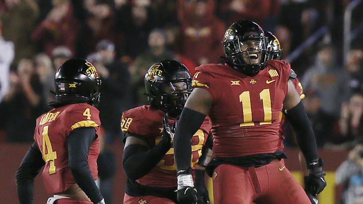 Iowa State Cyclones defensive line Tyler Onyedim (11) celebrates after a quarterback sack against Texas during the first quarter in the Big-12 football showdown at Jack Trice Stadium on Saturday, Nov. 18, 2023, in Ames, Iowa.