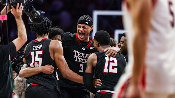 Feb 14, 2026; Tucson, Arizona, USA; Texas Tech Red Raiders forward LeJuan Watts (3) celebrates with teammates after they secure the win against the Arizona Wildcats at the end of overtime at McKale Memorial Center. Mandatory Credit: Aryanna Frank-Imagn Images