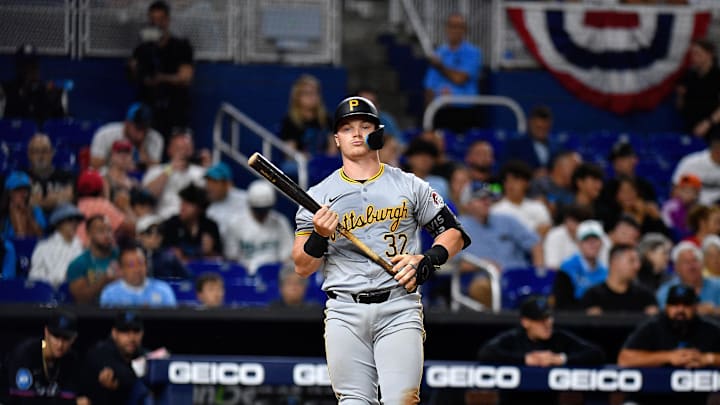 Mar 29, 2024; Miami, Florida, USA;  Pittsburgh Pirates catcher Henry Davis (32) strikes out during the fifth inning against the Miami Marlins at loanDepot Park. Mandatory Credit: Michael Laughlin-Imagn Images