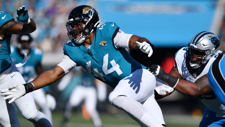 Jacksonville Jaguars linebacker Travon Walker (44) goes in for the sack on Carolina Panthers quarterback Bryce Young (9) in Jacksonville, FL Sunday, December 31, 2023. 