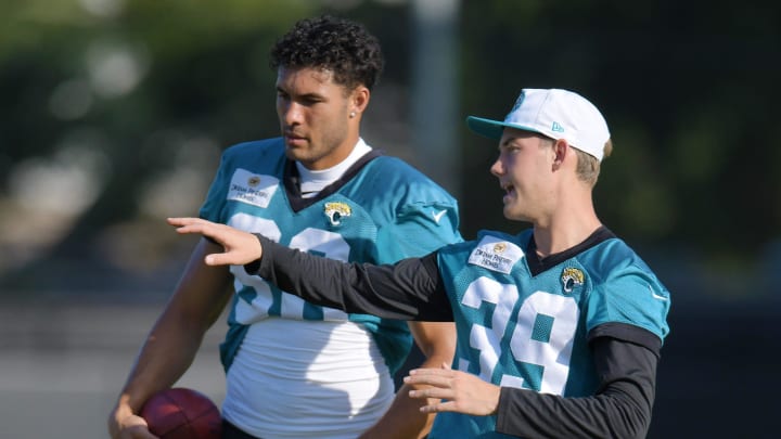 Jacksonville Jaguars tight end Patrick Murtagh (88) talks with place kicker Cam Little (39) during the fifth day of the NFL football training camp practice session Monday, July 29, 2024 at EverBank Stadium's Miller Electric Center in Jacksonville, Fla..