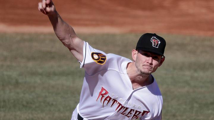 The Wisconsin Timber Rattlers   s starting pitcher Justin Jarvis (10) during the team   s home opener against the Peoria Chiefs on Saturday, April 9, at Neuroscience Group Field at Fox Cities Stadium in Grand Chute, Wis.  Ernesto Mart   nez Jr (9), hit a walk-off single in the tenth inning to defeat the Peoria Chiefs 7-6.
Wm. Glasheen USA TODAY NETWORK-Wisconsin

Apc Rattlers Home Opener 10982 040922wag