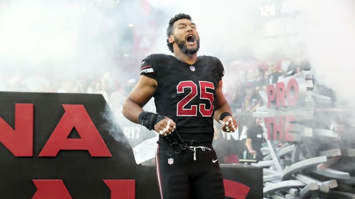 Arizona Cardinals linebacker Zaven Collins (25) during player introductions before facing the Los Angeles Rams at State Farm Stadium in Glendale on Nov. 26, 2023.