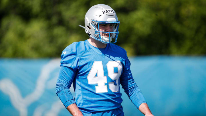 Detroit Lions long snapper Hogan Hatten (49) 