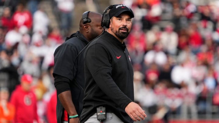 Ohio State Buckeyes head coach Ryan Day looks to the scoreboard