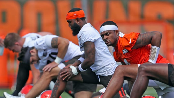 Browns quarterback Deshaun Watson stretches with the team during minicamp, Tuesday, June 11, 2024, in Berea.