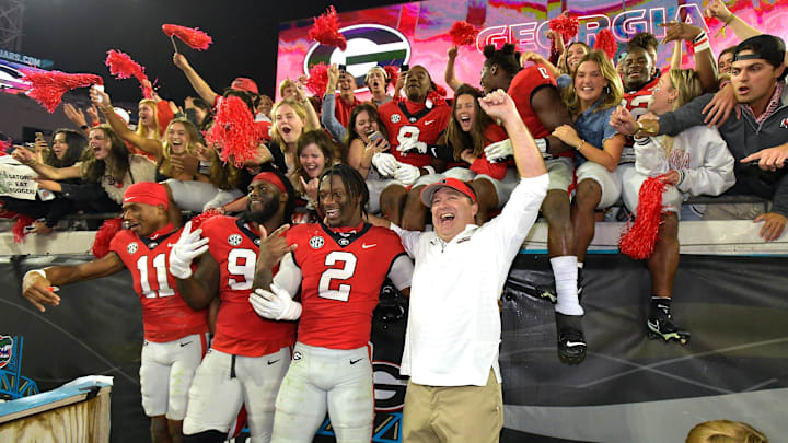 Georgia Bulldogs head coach Kirby Smart celebrates with his players and fans after their victory over Florida. The annual Georgia vs Florida football rivalry was held at TIAA Bank Field in Jacksonville, FL Saturday, October 29, 2022. The Bulldogs went in at halftime with a 28 to 3 lead over the Gators and won with a final score of 42 to 20. [Bob Self/Florida Times-Union]

Jki 102822 Bs Georgia Vs Florida Football Game 2nd Half 06