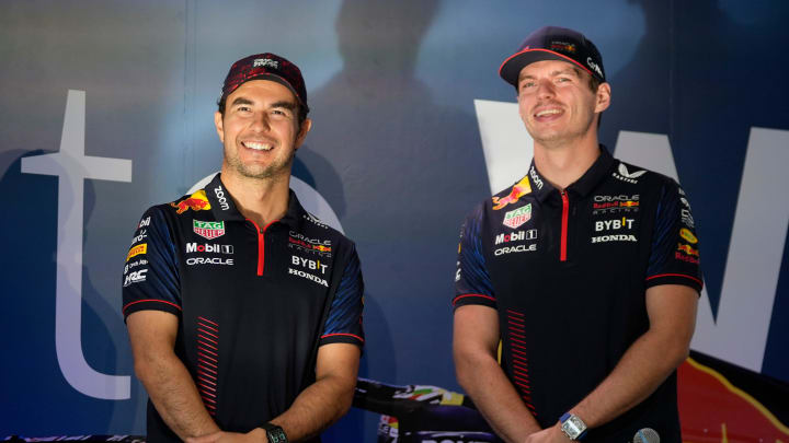 Oracle Red Bull Racing drivers Sergio Perez, left, and Max Verstappen speak at the Red Bull Fan Zone, a private event at Oracle headquarters, on Wednesday October 18, 2023. at the Red Bull Fan Zone, a private event at Oracle headquarters, on Wednesday October 18, 2023.