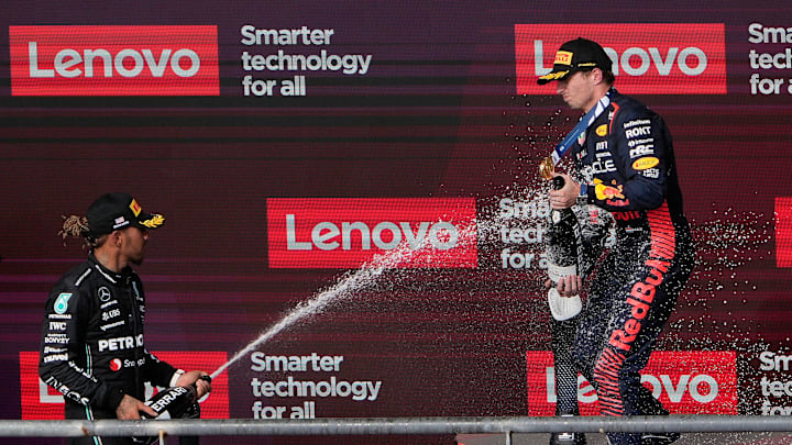 Oracle Red Bull Racing driver Max Verstappen of The Netherlands, right, celebrates with Mercedes AMG Petronas driver Lewis Hamilton of United Kingdom after Verstappen won the Formula 1 Lenovo United States Grand Prix at Circuit of the Americas on Sunday October 22, 2023. at the Formula 1 Lenovo United States Grand Prix at Circuit of the Americas on Sunday October 22, 2023.