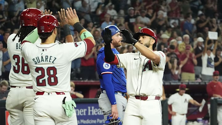 Arizona Diamondbacks Adrian Del Castillo (25) reacts after hitting a three-run home run against the Texas Rangers in the fifth inning at Chase Field in Phoenix on Sept. 11, 2024.